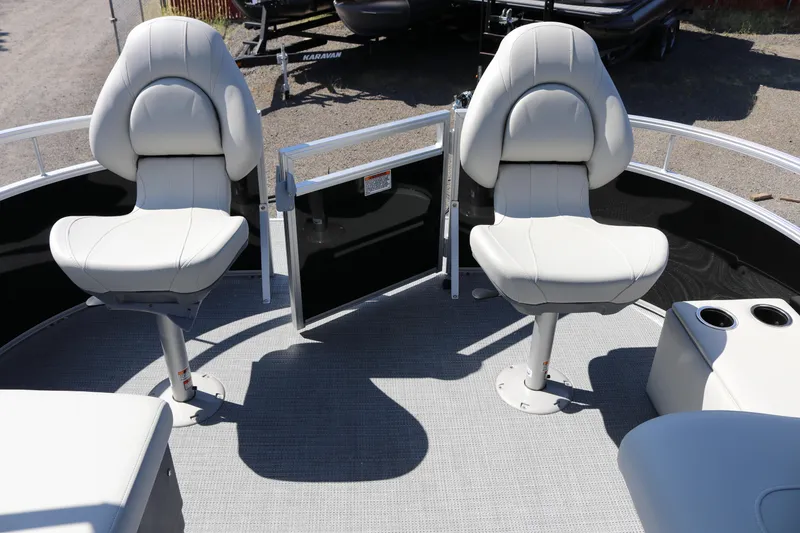 Slide: The Image of 2025 SunChaser Vista 20 Fish boat interior with two swivel seats and cup holders. - 6