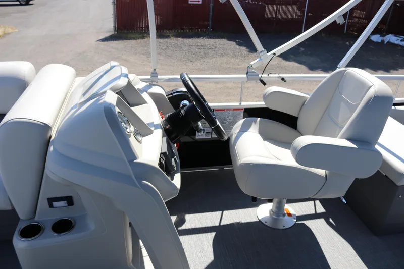 Slide: The Image of Captain's seat and helm of 2025 SunChaser Vista 20 Fish boat. - 27