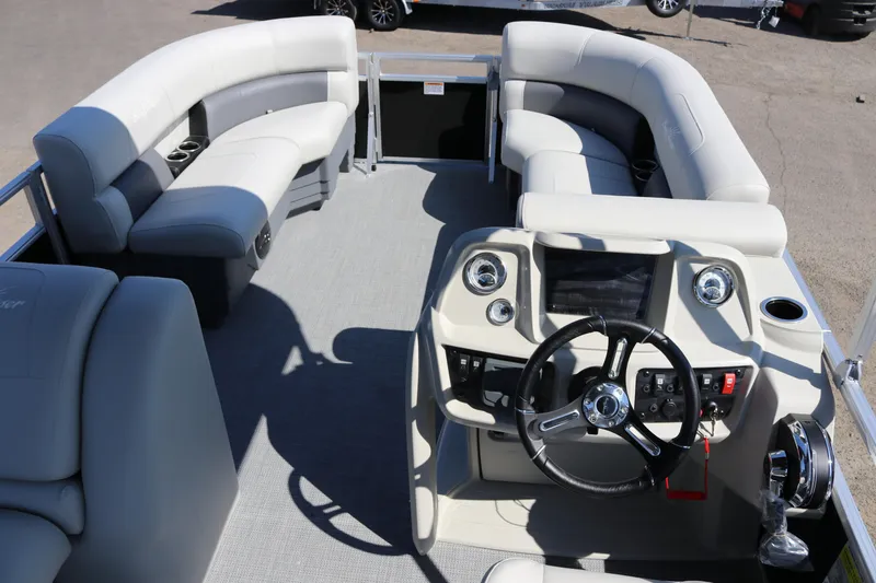 Slide: The Image of 2025 SunChaser Vista 20 Fish boat interior with plush seating and modern helm controls. - 22