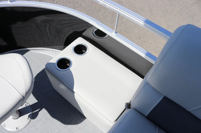 Slide: The Image of 2025 SunChaser Vista 20 Fish boat interior with cup holders and seating. - 9