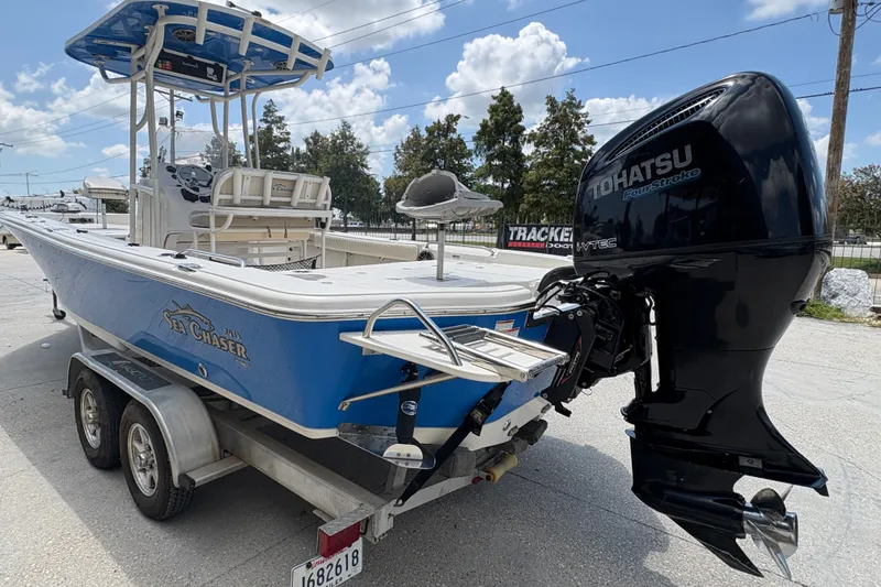 Slide: The Image of 2019 Sea Chaser 26 LX boat with Tohatsu outboard motor on trailer. - 5