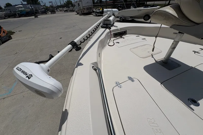 Slide: The Image of 2019 Sea Chaser 26 LX boat with Minn Kota trolling motor on deck. - 20