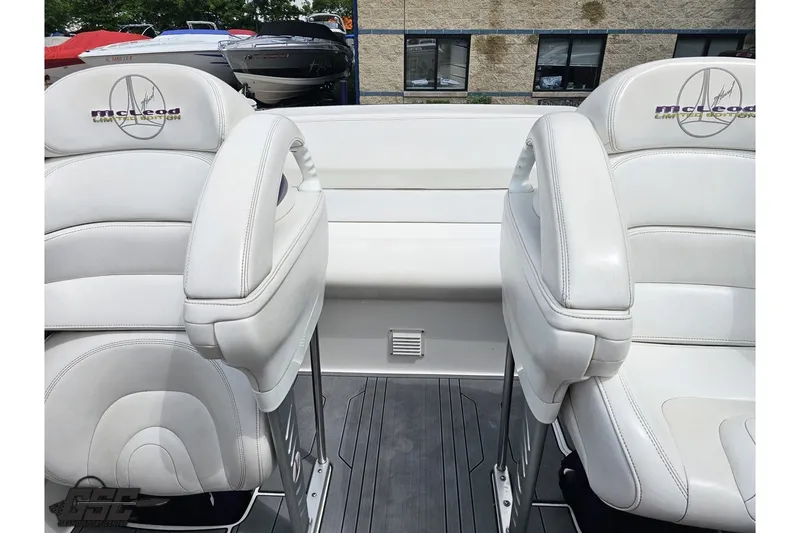 Slide: The Image of 2007 Sunsation 32 Dominator boat interior with white McLeod seats and sleek design. - 89