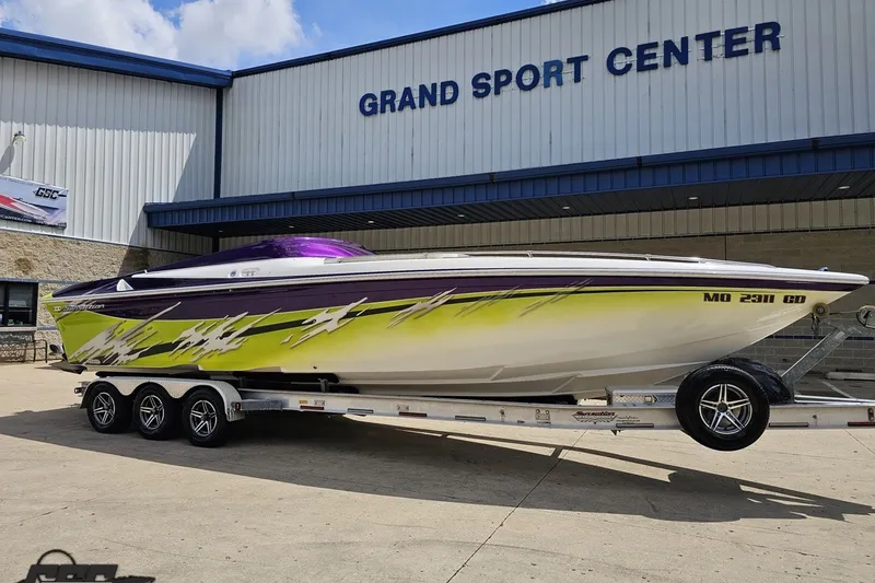Slide: The Image of 2007 Sunsation 32 Dominator boat on trailer at Grand Sport Center. - 13