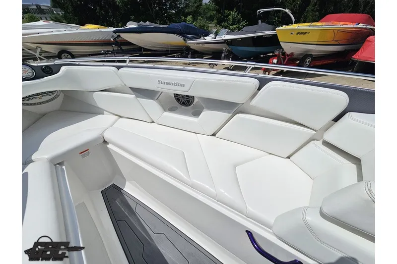 Slide: The Image of 2007 Sunsation 32 Dominator boat interior with white seating and sleek design. - 81