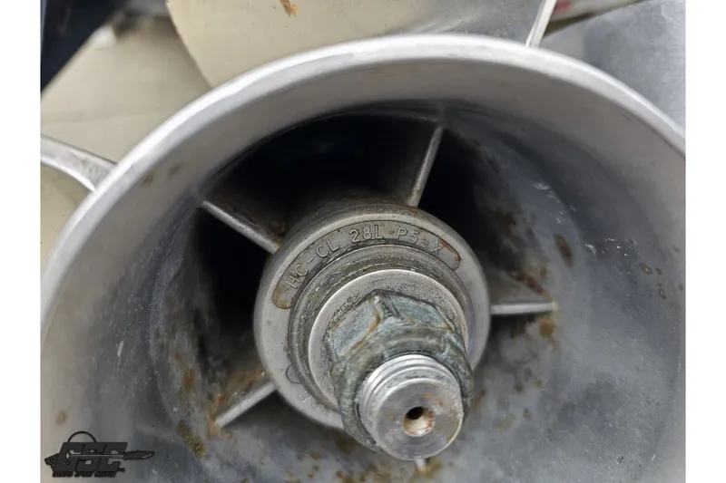 Slide: The Image of Close-up of a 2007 Sunsation 32 Dominator boat propeller with visible markings. - 106