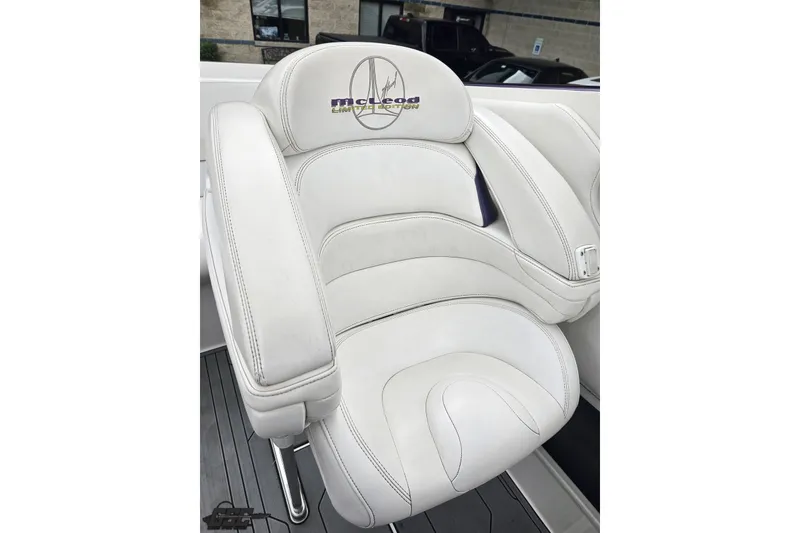 Slide: The Image of White McLeod seat in a 2007 Sunsation 32 Dominator boat interior. - 91