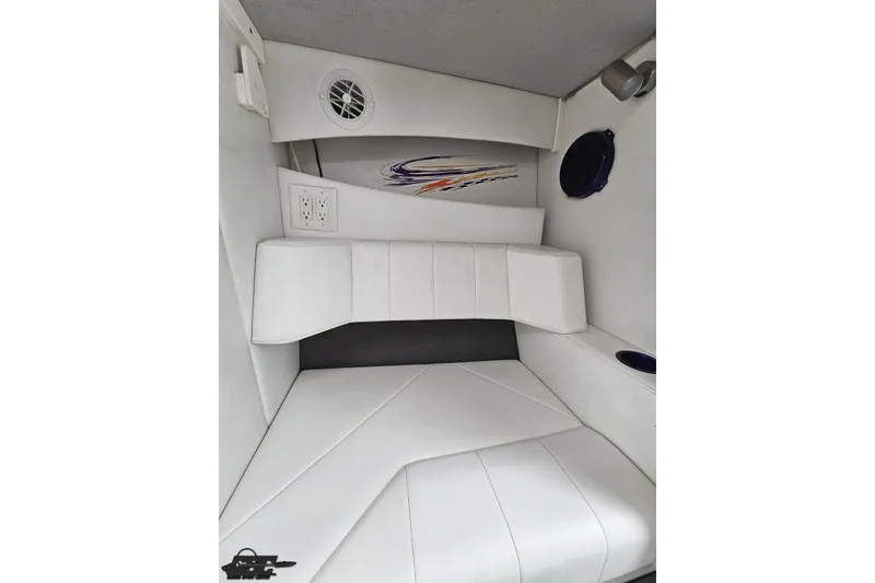 Slide: The Image of Interior of 2007 Sunsation 32 Dominator boat with white seating and modern design. - 78