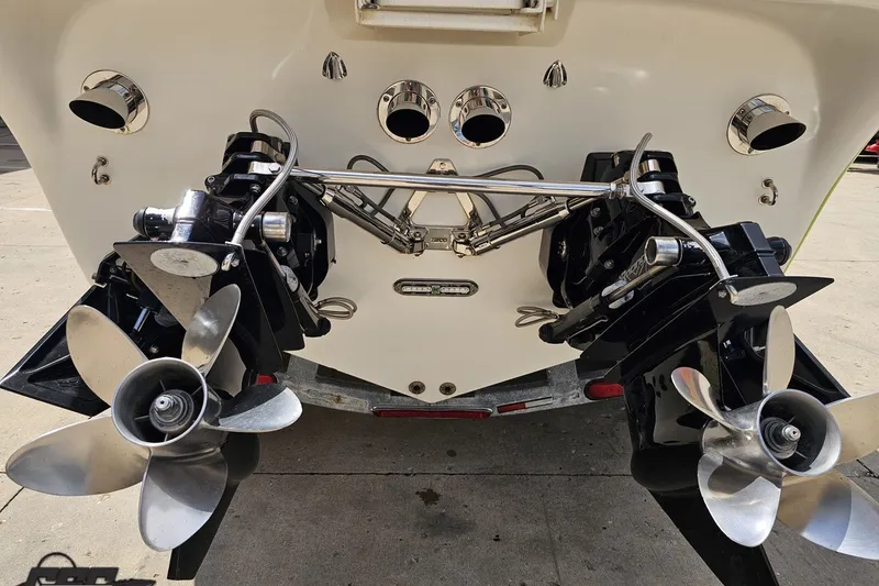 Slide: The Image of 2007 Sunsation 32 Dominator boat stern with dual propellers and exhaust ports. - 30