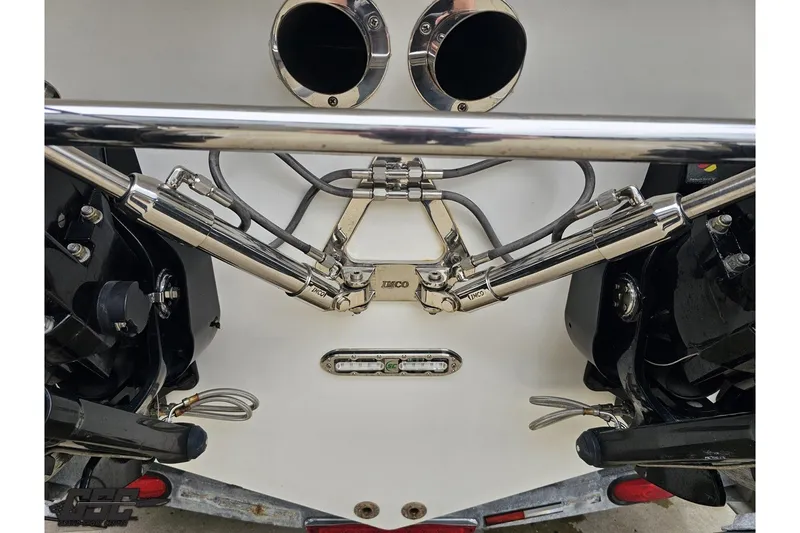 Slide: The Image of Close-up of 2007 Sunsation 32 Dominator boat's engine components and exhaust system. - 33