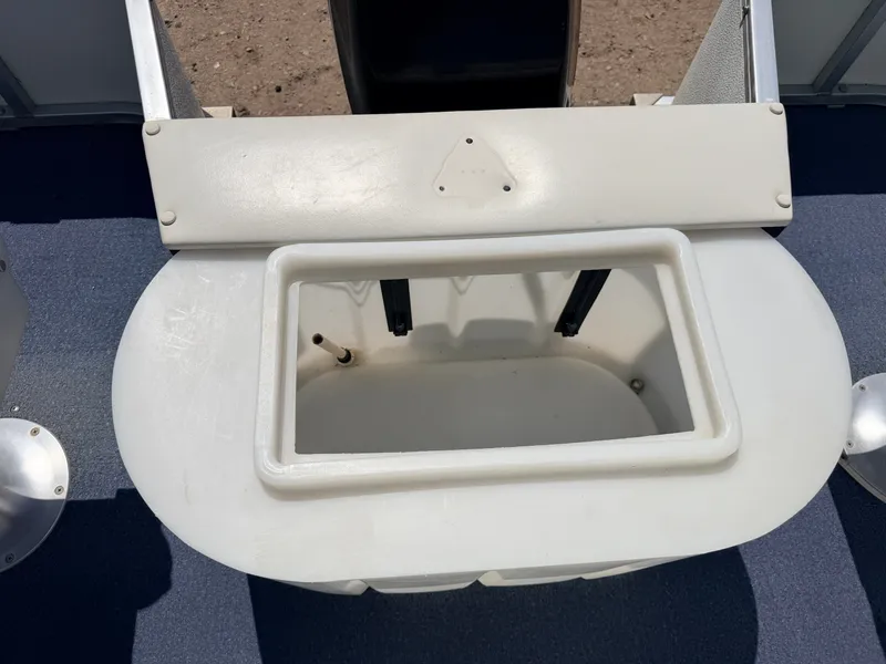 Slide: The Image of A white boat component with a rectangular compartment, surrounded by a blue surface. - 45