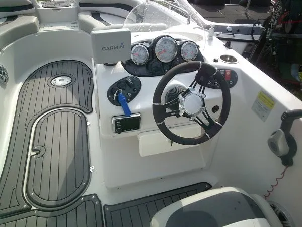 Slide: The Image of The image shows the cockpit of a 2019 Starcraft Allstar 1915 boat with a modern helm. - 3