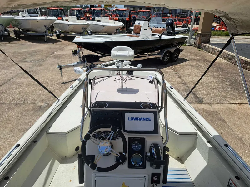 Slide: The Image of The image shows the cockpit of a 2022 Ranger RB190 boat with a Lowrance navigation system. - 12