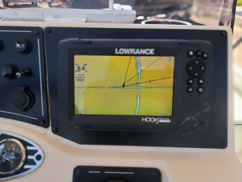 Slide: The Image of A Lowrance Hook GPS device on a 2022 Ranger RB190 boat displaying a map. - 26