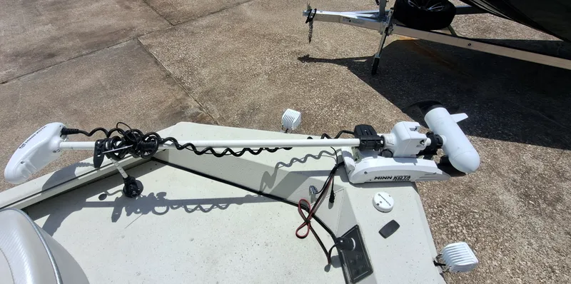 Slide: The Image of A 2022 Ranger RB190 boat with a Minn Kota trolling motor mounted on the deck. - 18
