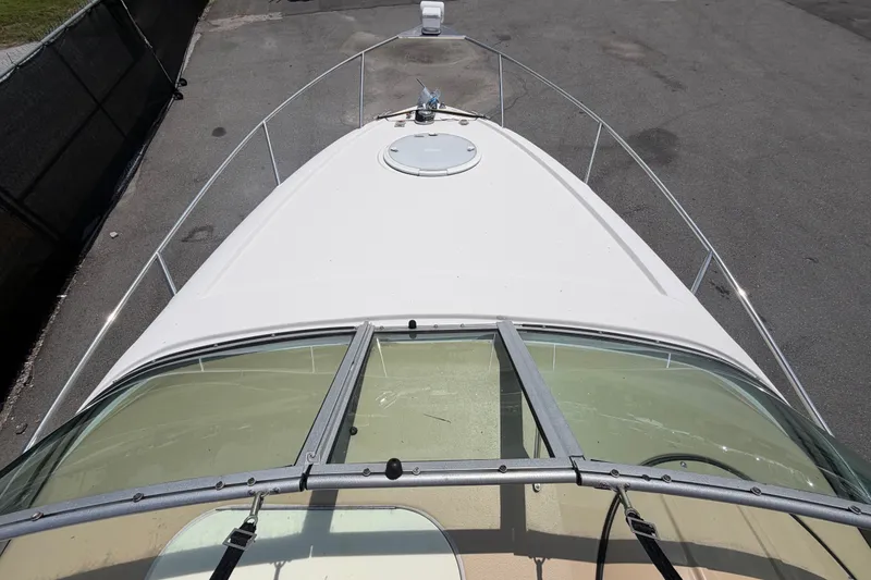 Slide: The Image of 2016 Glastron GS 259 boat deck view with windshield and railing. - 72