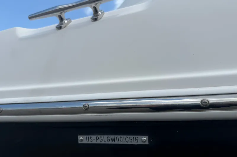 Slide: The Image of 2016 Glastron GS 259 boat hull with identification number plate. - 93