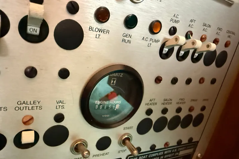 Slide: The Image of Control panel of a 1987 Chris-Craft 362 Catalina boat with engine hour meter. - 23