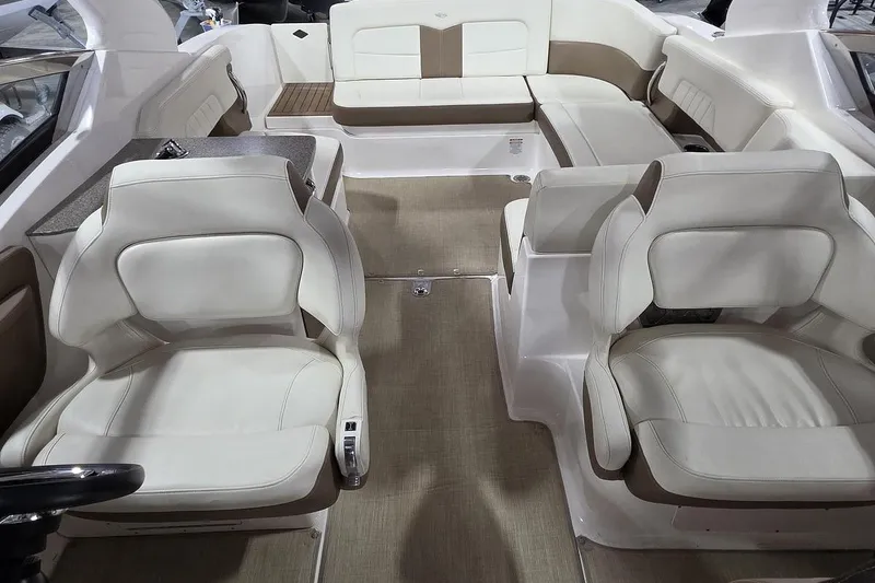 Slide: The Image of Interior of 2014 Chaparral 307 SSX boat with luxurious seating and modern design. - 18