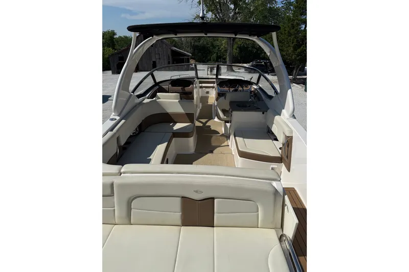 Slide: The Image of 2014 Chaparral 307 SSX boat interior with spacious seating and modern design. - 7