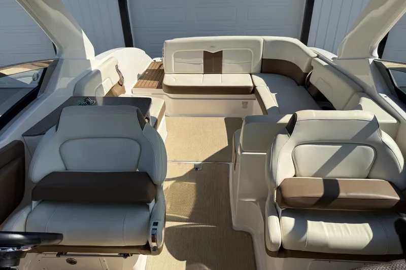 Slide: The Image of 2014 Chaparral 307 SSX boat interior with luxurious seating and modern design. - 10