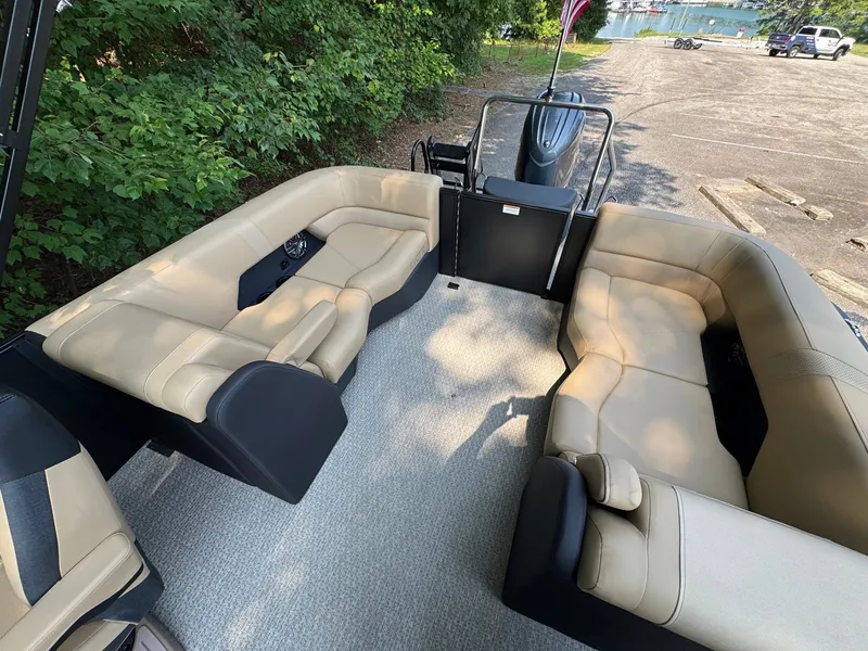 Slide: The Image of The image shows the spacious cockpit of a 2027 Evotti 521QL with beige seating. - 19