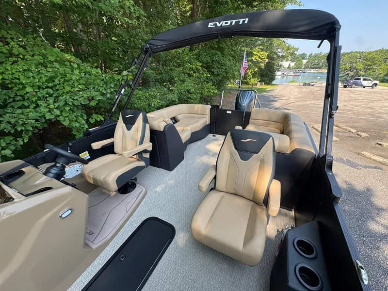 Slide: The Image of The image shows a 2027 Evotti 521QL boat with luxurious seating and an open deck. - 18