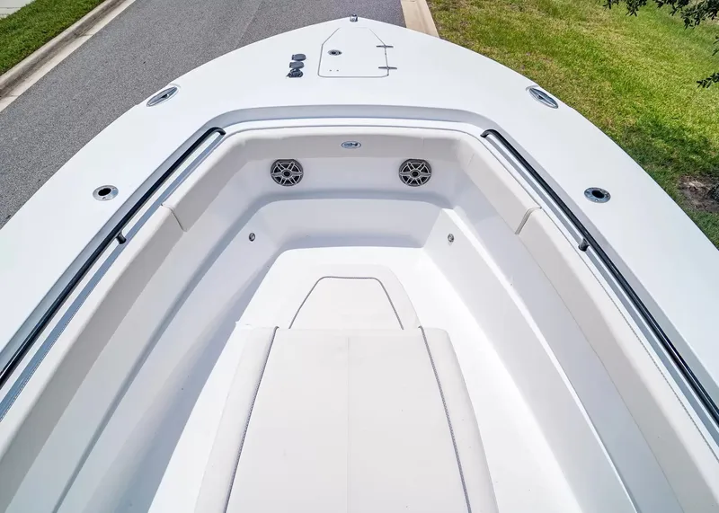 Slide: The Image of The image shows the bow area of a 2027 Sea Hunt Gamefish 27 Coffin Box boat. - 26