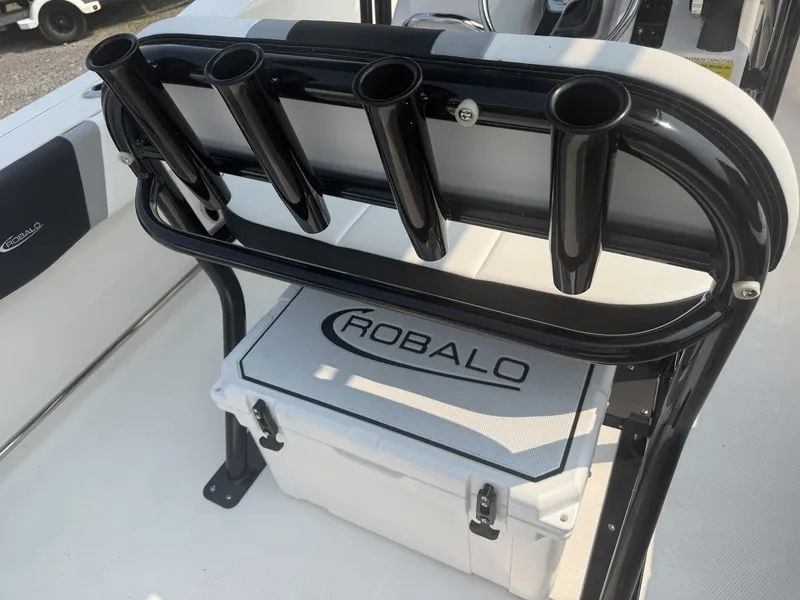 Slide: The Image of The 2027 Robalo R200 Center Console features a rod holder and a cooler. - 8