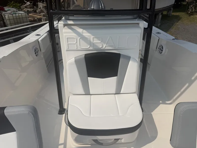 Slide: The Image of The 2027 Robalo R200 Center Console features a stylish white seat with black accents. - 3