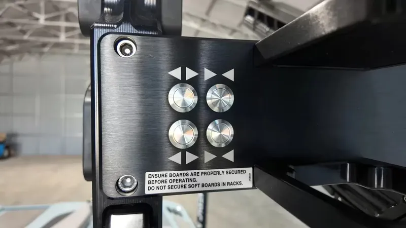 Slide: The Image of Close-up of a control panel with four buttons and safety instructions. - 39