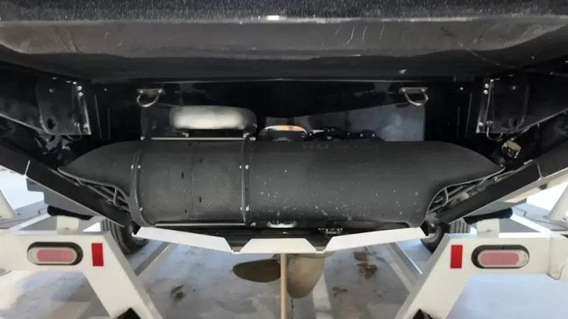 Slide: The Image of Underside of a 2024 MasterCraft XStarS boat on a trailer. - 12