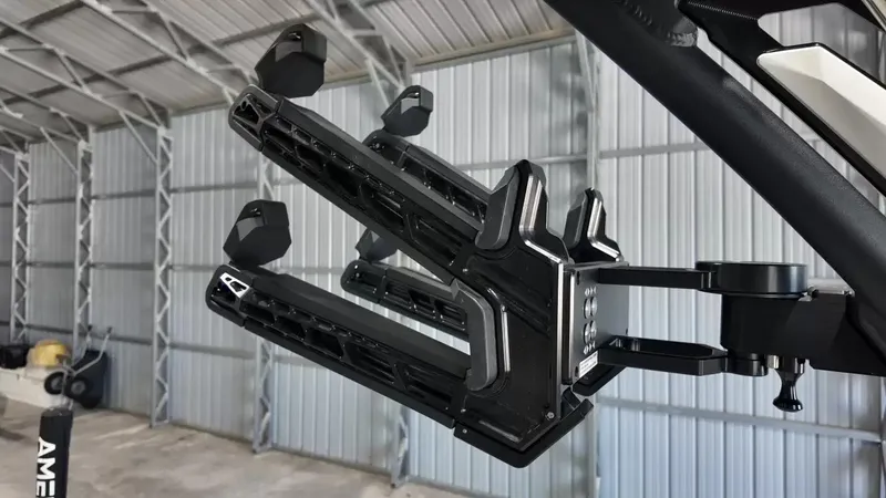 Slide: The Image of A wakeboard rack on a boat in a storage facility. - 38