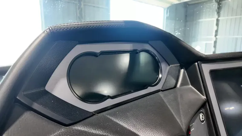 Slide: The Image of The image shows the dashboard of a 2024 MasterCraft XStarS boat with a modern display. - 47
