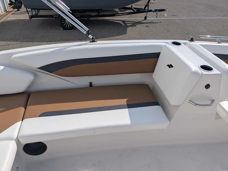 Slide: The Image of The image shows the cockpit of a 2025 Starcraft SVX 171 OB with beige and gray seating. - 10