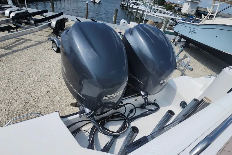 Slide: The Image of Twin Yamaha 250 outboard engines on a 2005 Seaswirl Striper 2901 Walkaround O/B boat. - 15