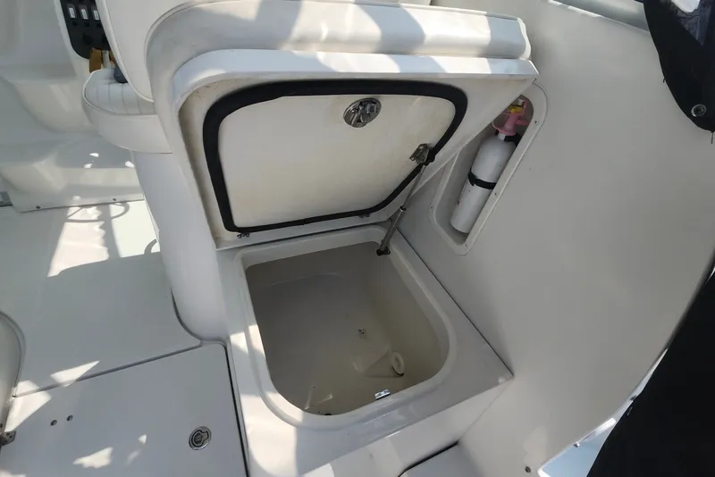 Slide: The Image of Open storage compartment on 2005 Seaswirl Striper 2901 Walkaround O/B boat interior. - 26
