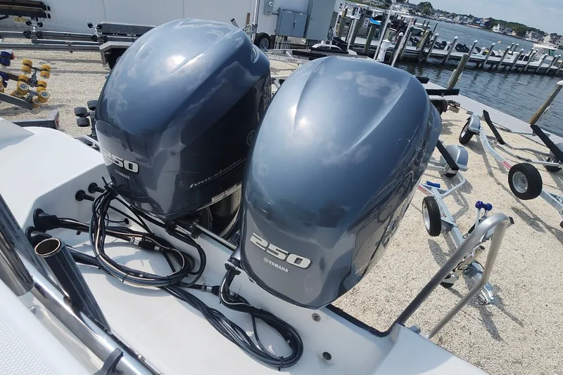 Slide: The Image of Twin Yamaha 250 outboard engines on a 2005 Seaswirl Striper 2901 Walkaround O/B boat. - 16