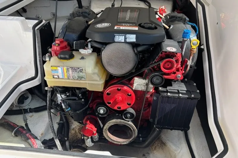 Slide: The Image of Engine compartment of a 2016 Regal 24 FasDeck boat, featuring a Volvo Penta engine. - 18