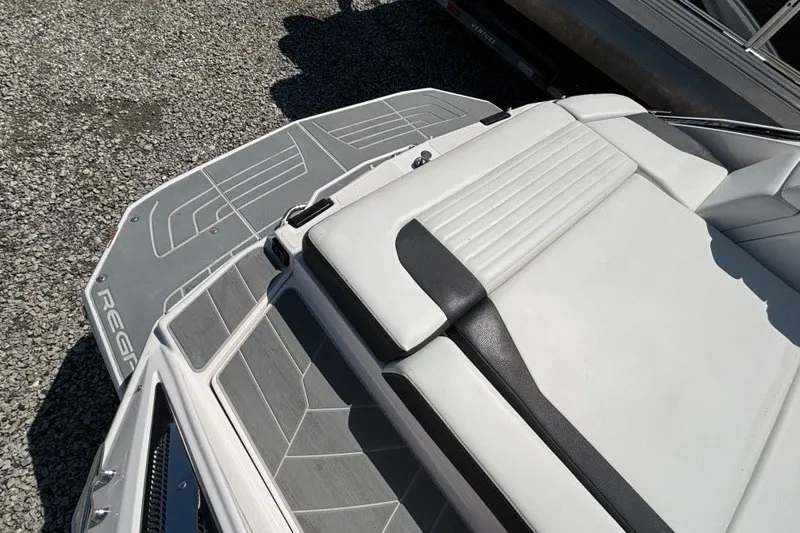 Slide: The Image of 2016 Regal 24 FasDeck boat with sleek seating and deck design. - 14