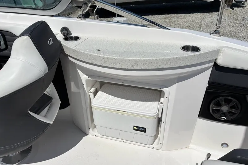 Slide: The Image of Interior of 2016 Regal 24 FasDeck boat with seating and storage compartment. - 10