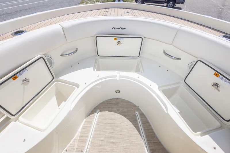 Slide: The Image of 2023 Chris-Craft Catalina 30 boat interior with storage compartments and seating area. - 42