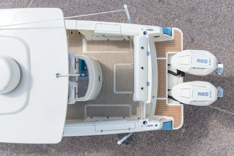 Slide: The Image of Aerial view of 2023 Chris-Craft Catalina 30 boat with dual outboard engines. - 22