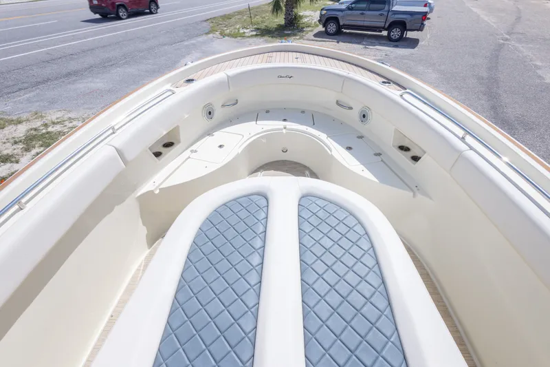 Slide: The Image of 2023 Chris-Craft Catalina 30 boat interior with cushioned seating and elegant design. - 41