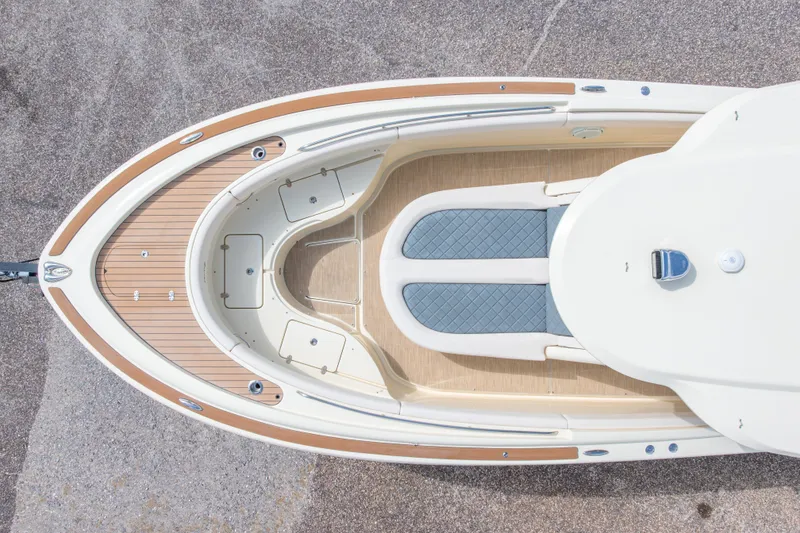 Slide: The Image of Top view of 2023 Chris-Craft Catalina 30 boat, showcasing elegant deck design. - 21