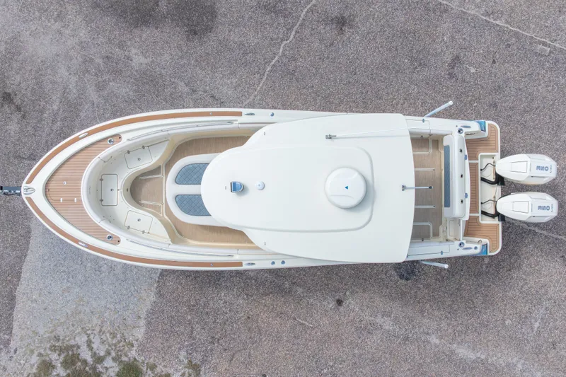 Slide: The Image of Aerial view of 2023 Chris-Craft Catalina 30 boat with twin engines. - 6
