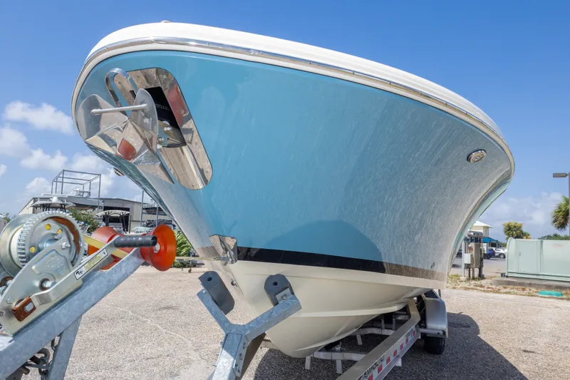 Slide: The Image of 2023 Chris-Craft Catalina 30 boat on trailer, blue hull, sunny day. - 17