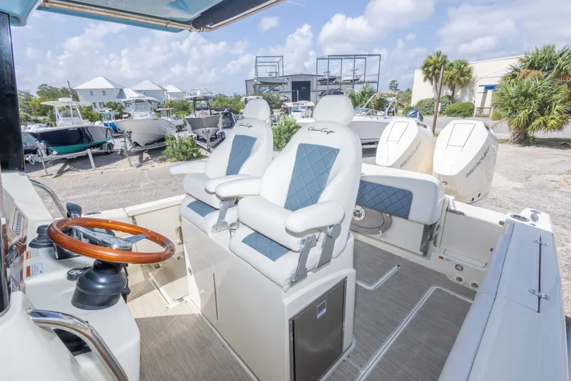 Slide: The Image of 2023 Chris-Craft Catalina 30 boat interior with luxury seating and dual Mercury engines. - 47