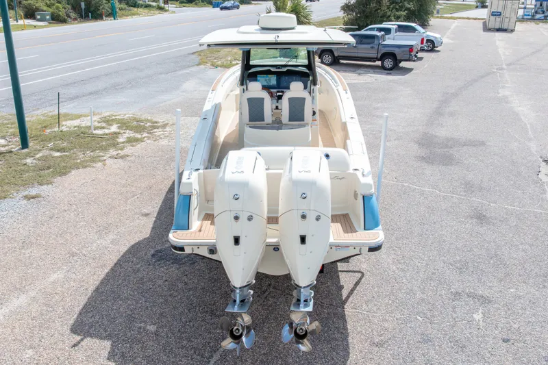 Slide: The Image of 2023 Chris-Craft Catalina 30 boat with dual outboard engines, parked on a lot. - 61