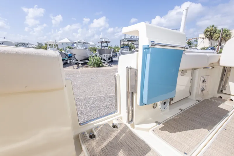 Slide: The Image of 2023 Chris-Craft Catalina 30 interior with open door, showcasing sleek design and modern features. - 50
